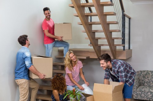 House removal team planning a move in Edgware with boxes and furniture