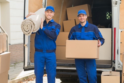 Removal team handling flat moving access in Edgware