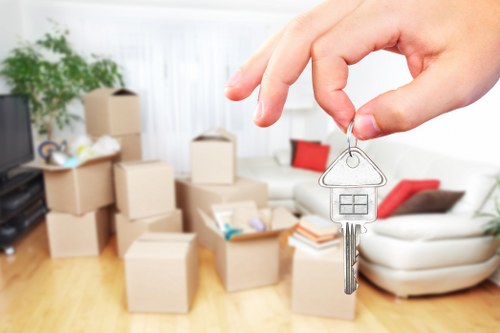 Removal team planning a house move in Edgware with boxes and furniture