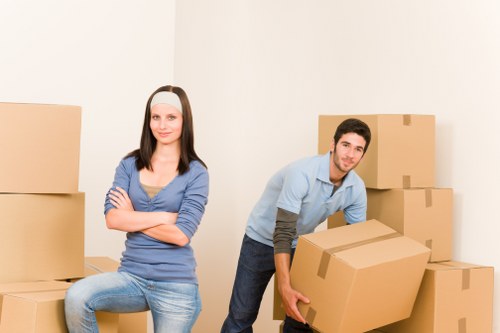 Boxes and furniture arranged for a local house removal service
