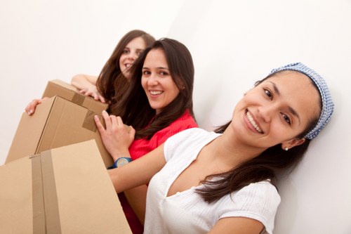 Careful unloading of household belongings at a new Edgware property