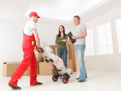 Local removal crew loading household furniture for an Edgware move