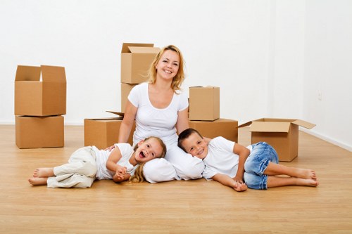 Loading furniture and boxes into a van for a local Edgware move