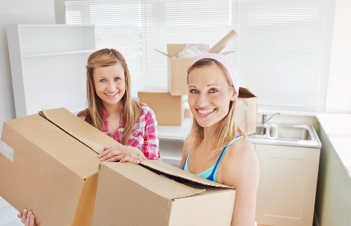 Packed household boxes and furniture ready for removals in Edgware